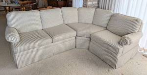 lot 13 image: Curved Plaid Sectional Sofa