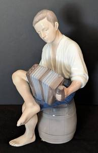 lot 30 image: Bing & Grndahl Merry Sailor Playing Accordion Porcelain Figurine  Bing & Grndahl 1661
