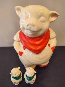 lot 4 image: Shawnee Pottery Smiling Pig Cookie Jar  Two Piggy Salt & Pepper Shakers