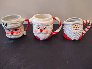 lot 113 image: Three Vintage Santa Mugs