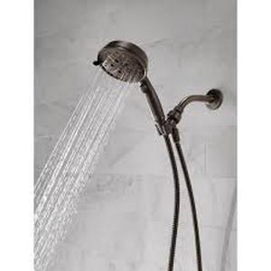lot 31 image: Delta 7-Spray Wall Mount Handheld Shower Head 1.8 GPM in SpotShield Venetian Bronze Customer Returns See Pictures