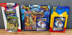 lot 64B image: Brand New Pokmon TCG Lightning Set 4 Packs and 1 Bonus Card, Pokmon TCG Scarlet & Violet Spidops Blister Pack and Pokmon TCG Mystery Pack with 20 Cards and 1 Foil Card N
