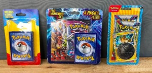 lot 58B image: Brand New Pokmon TCG Lightning Set 4 Packs and 1 Bonus Card, Pokmon Pawmot Coin and 2 Booster Packs and Pokmon TCG Mystery Pack with 20 Cards and 1 Foil Card N