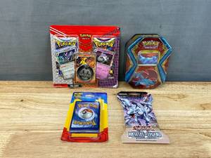 lot 7B image: Brand New Pokemon and Yu-Gi-Oh Cards Mystery Pack, Salamence Tin Pack, RevaroomArmarougeHoundstone Blister Pack and  Yu-Gi-Oh Battle of Legends N