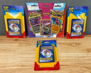lot 23B image: Brand New Pokmon TCG Articuno, Moltres and Zapdos Cards with 2 Booster Packs and Coin and 3 Pokmon TCG Mystery Packs of 20 Cards with 1 Foil Card N