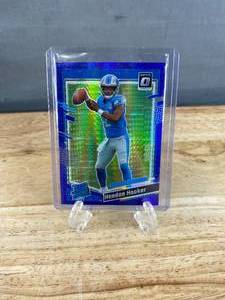 lot 161 image: 2023 Panini Donruss Optic Hendon Hooker Blue Wave Prizm Rated Rookie #234 J