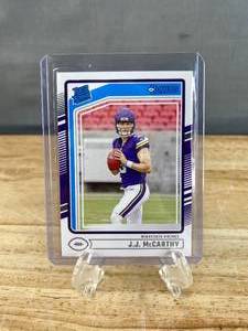 lot 128 image: 2023 Panini Donruss JJ McCarthy Rated Rookie #303 T