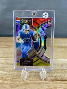lot 133 image: 2023 Panini Select Sam LaPorta Red and Yellow Die Cut Prizm Premier Level RC #106 J