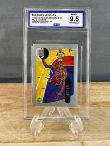 lot 57 image: 1998 Upper Deck International Michael Jordan Sticker #18 Graded CCG Mint 9.5 J