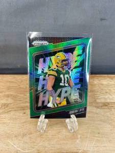 lot 52 image: 2024 Panini Prizm Jordan Love Green Hype Prizm #2 T