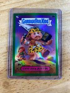 lot 226 image: 2024 Topps Chrome Garbage Pail Kids Cave Jock Justin Green Refractor Numbered 3699 #13B J