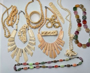 lot 11 image: Large Carved Bone Shell Style Jewelry