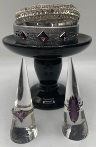 lot 19 image: Sterling and Amethyst Stone Rings and Silver Tone Bracelets