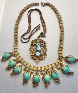 lot 79 image: Vintage Miriam Haskell Style Beaded Dangle Necklace Turquoise Beads and Art Deco Brass and Floral Pendant Necklace