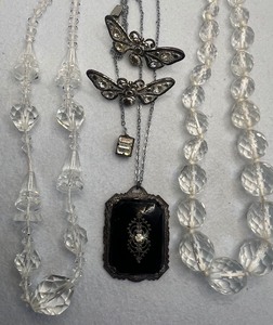 lot 111 image: Antique Art Deco Pendant Necklace Camphor Glass Manganese Looks Black, Purple with Light Behind It