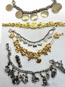 lot 104 image: Lot of 5 Religious Theme Charm Bracelets