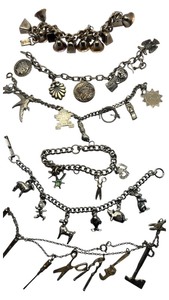 lot 110 image: Lot of 5 Silver tone Charm Bracelets and Silver tone Charm Tool Necklace