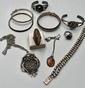 lot 60 image: Sterling Silver Bangles and Two Strand Silver and Gold Bracelet