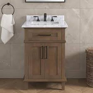 lot 8 image: Home Decorators Collection Sonoma 24 in. Single Sink Almond Latte Bath Vanity with Carrara Marble Top (Assembled) Customer Returns See Pictures