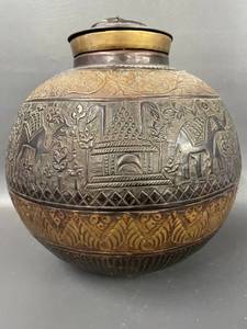 lot 33 image: Embossed Brass Jungle Motif Jar