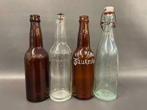 lot 64 image: Vintage Glass Bottles Fox Head, HBC, Stillwater, MN