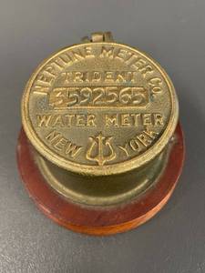 lot 75 image: Vintage Neptune Meter Co. Trident Water Meter Cap