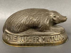 lot 77 image: Vintage Badger Mutual Insurance Cast Iron Paperweight