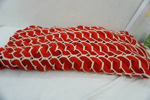 lot 35 image: large red & white Afghan quilt