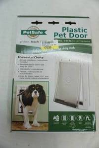 lot 43 image: plastic pet door. new in package