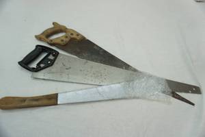 lot 72 image: 2 hand saws & machete