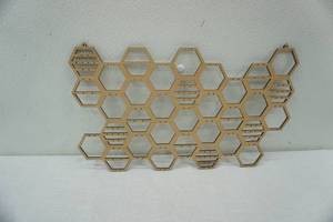 lot 109 image: hanging honeycomb jewelry display