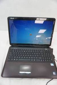 lot 197 image: Asus laptop. powers up