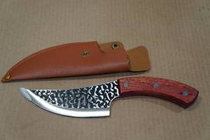 lot 134 image: Hammered Carbon Steel 10 Knife
