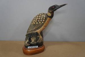 lot 162 image: Hand Carved Buffalo Horn Loon Statue
