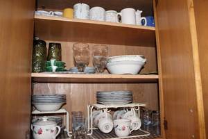 lot 12 image: Vintage Floral Ceramic Dinnerware Set with Assorted Mugs and Glasses