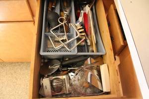 lot 16 image: Assorted Kitchen Utensil Collection with Pie Cutter and Whisks