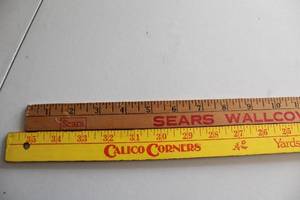 lot 31 image: Pair of Vintage Advertising Yardsticks Sears Wallcoverings and Calico Corners
