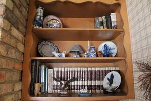 lot 36 image: Collection of World Book Encyclopedias and Decorative Items