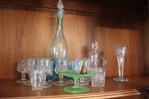 lot 43 image: Collection of Vintage Glassware Including Decanters, Goblets, and Decorative Plate