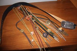 lot 124 image: Collection of Western Bolo Ties and Buckle Set