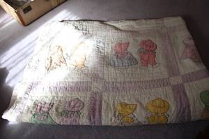 lot 151 image: Vintage Hand-Stitched Quilt with Sunbonnet Sue and Overall Sam Design