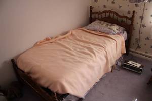 lot 156 image: Twin Size Vintage Wood Bed with Floral Headboard and Footboard