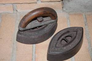 lot 217 image: Antique Cast Iron Sad Irons Set with Wooden Handles