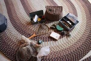 lot 249 image: Vintage Fishing Gear Set with Nets, Reels, and Tackle Boxes