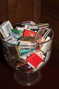 lot 257 image: Collection of Vintage Matchbook Covers in Glass Container