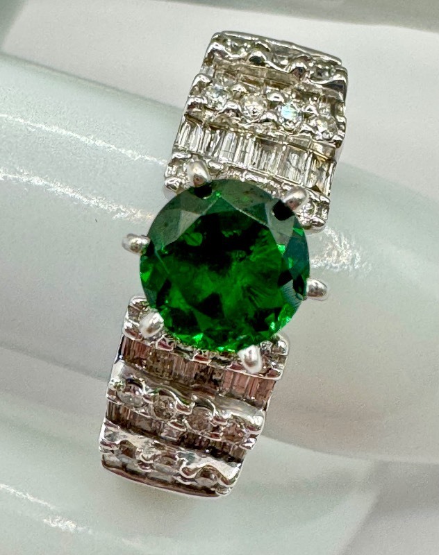 lot 58J image: 18k White Gold Emerald and Diamond Ring