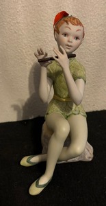 lot 66 image: Cybis Porcelain Peter Pan Figurine