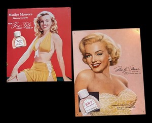 lot 71 image: Marilyn Monroe Tin Advertising Signs for Jon-Joy Cosmetics and Tru-Glo Liquid Make Up