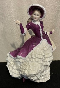lot 276 image: Royal Doulton Christmas Day 2004 Fancy Lady Figurine