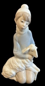 lot 299 image: Lladr Shepherd with Lamb Figurine  Vintage Shepherd with Lamb Porcelain Figurine by Lladr-LLadr